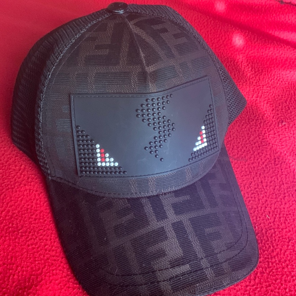 A fendi cap it used but in perfect shape